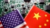 FILE - Flags of China and U.S. are displayed on a printed circuit board with semiconductor chips, in this illustration picture taken Feb. 17, 2023. 