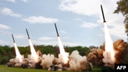 22일 북한 비공개 장소에서 진행된 핵반격가상종합전술훈련 중 방사포가 발사되는 모습. 북한 관영매체 조선중앙통신이 23일 보도.