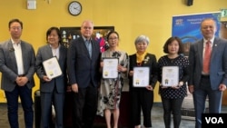 Author and screenwriter Yan Geling (center) attends a book event in San Gabriel, California, April 16, 2024.