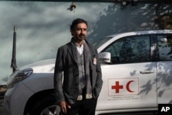 FILE - Alexander Matheou, regional director, Asia Pacific Region for the International Federation of the Red Cross, speaks to the Associated Press in Kabul, Afghanistan, Dec, 2, 2021.