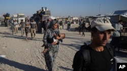 Palestinians flee the Khan Younis area of the Gaza Strip, following Israeli military evacuation orders, saying its forces will soon operate there, Aug. 8, 2024.