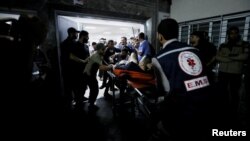 Prihvat ljudi povređenih u bolnici u Gazi (Foto: REUTERS/Mohammed Al-Masri)