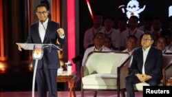 Former Jakarta Governor and presidential candidate Anies Baswedan speaks during the televised debate at the Istora Senayan stadium in Jakarta, Jan. 7, 2024.