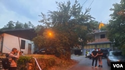 Policija i novinari na mestu pucnjave u Cetinju, 12. avgusta 2022.