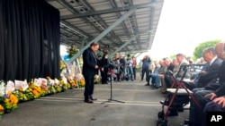 Pastor Albany Lee addresses congregants Saturday, May 22, 2022, as survivors and church leaders join in prayer and thank community members for their support nearly a week after a deadly shooting at a Taiwanese American church congregation in Laguna Woods, California.