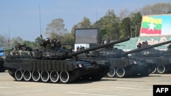 Myanmar military vehicles are displayed at a parade ground to mark the country's Independence Day in Naypyidaw on Jan. 4, 2023.