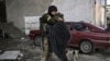 A Ukrainian soldier hugs his wife in the city of Irpin, north of Kyiv, March 10, 2022. 