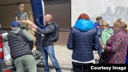 This photo, provided by the World Food Program, shows food being distributed to people in Kharkiv during the conflict in Ukraine. (Image Credit: WFP/Paul Anthem)