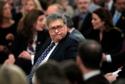 FILE - Attorney General William Barr arrives before President Donald Trump speaks in the East Room of the White House about his judicial appointments, Nov. 6, 2019 in Washington.