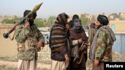 Members of the Taliban gather in Ghazni province, Afghanistan, April 18, 2015. Iran, according to Afghan lawmakers, is supplying sophisticated weapons to the Taliban. 