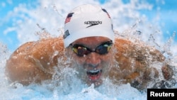 Caeleb Dressel of the United States in action in Men's 100m Butterfly, Tokyo, Japan, July 29, 2021.