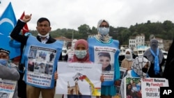 Members of Uyghur community living in Turkey stage a protest outside the Chinese consulate in Istanbul, June 2, 2021. They protest agains alleged oppression by the Chinese government to Muslim Uyghurs in far-western Xinjiang province.