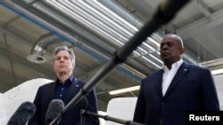 U.S. Defense Secretary Lloyd Austin and U.S. Secretary of State Antony Blinken speak with reporters after returning from their trip to Kyiv and meeting with Ukrainian President Volodymyr Zelenskiy near the Polish-Ukrainian border