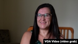 Vivian Barbosa, who lives in Sao Paulo, Brazil, smiles while she speaks during a Nov. 1, 2024, video interview with Yan Boechat. Because of her nursing degree and 20 years of experience, Barbosa is applying for a visa to work in the U.S. as a nurse. 
