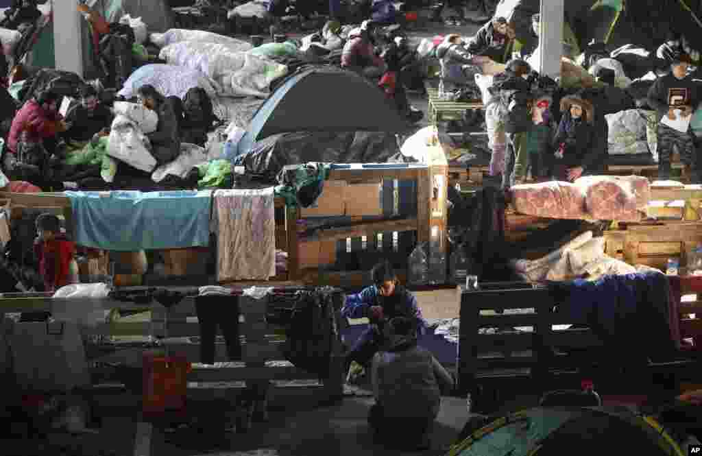 Migrants settle in the logistics center of the checkpoint "Bruzgi" at the Belarus-Poland border near Grodno, Belarus.