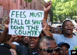 FILE - Students protest university fee hikes at a rally in Cape Town, South Africa, Oct. 22, 2015.