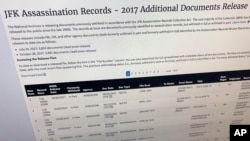 Part of a web page showing the page from the National Archives showing a listing of records released on Thursday, October 26, 2017. More than 200 files have been temporarily withheld.