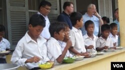 Students at En Komar Primary School in Kampong Thom province have receive breakfast on Tuesday, June 10, 2014. The breakfasts are part of a World Food Program initiative that aims to feed 3.5 million students by 2016.
