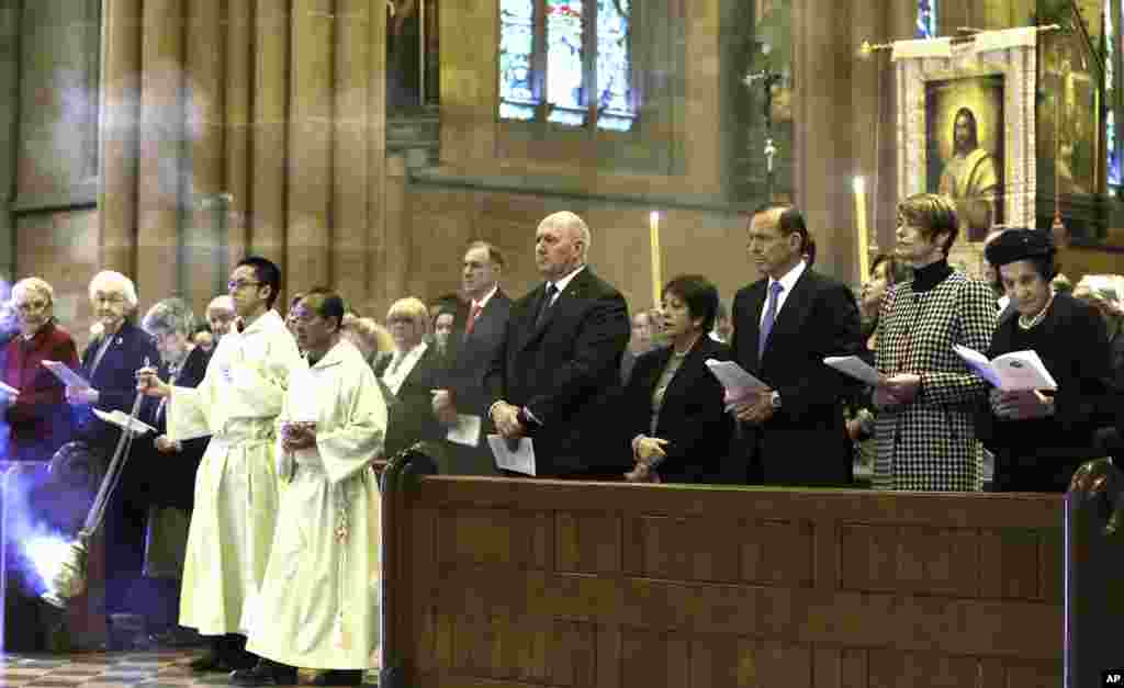 From right: New South Wales Governor Marie Bashir, Margie Abbott, Australia's Prime Minister Tony Abbott, Lady Lynne Cosgrove and Governor General Sir Peter Cosgrove attend a mass at St. Mary's Cathedral commemorating victims of Malaysia Airlines Flight 17, in Sydney, Australia, July 20, 2014.