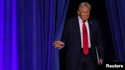President-elect Donald Trump takes the stage at the Palm Beach County Convention Center in West Palm Beach, Florida, Nov. 6, 2024. 