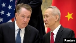 美国贸易代表莱特希泽与中国副总理刘鹤2019年2月15日在北京钓鱼台国宾馆交谈。