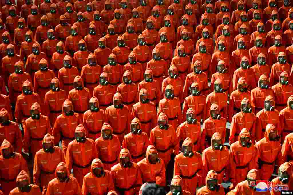 Paramilitary forces parade to mark the 73rd founding anniversary of the republic at Kim Il Sung square in Pyongyang in this undated image supplied by North Korea's Korean Central News Agency.