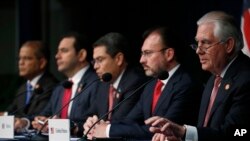 Secretary of State Rex Tillerson, right, gestures as he speaks during the Conference on Prosperity and Security in Central America, June 15, 2017, in Miami. Tillerson was joined by Mexican Foreign Secretary Luis Videgaray, second from left; Honduran President Juan Orlando Hernandez, center; Guatemalan President Jimmy Morales, second from left; and El Salvadoran Vice President Oscar Ortiz.