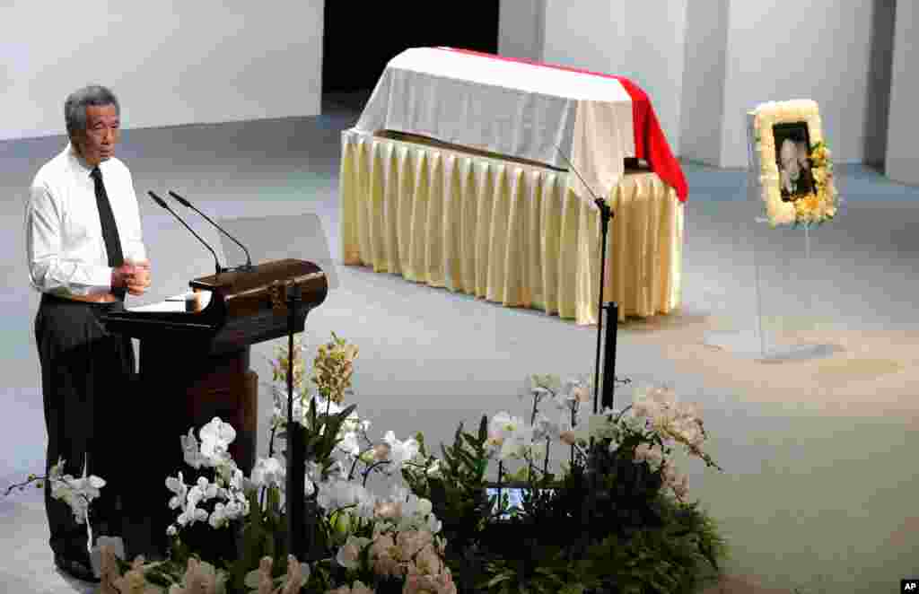 Singapore's Prime Minister Lee Hsien Loong, delivers his eulogy during a state funeral of his father, held at the University Cultural Center, March 29, 2015.