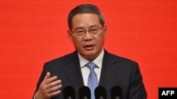 China's Premier Li Qiang delivers a speech during the China Developm.ent Forum in Beijing, March 24, 2024. After days of delay, Li congratulated new British Prime Minister Keir Starmer on his election.