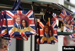 Commemorative items are seen for sale ahead of the upcoming wedding of Britain's Prince Harry and his fiancee Meghan Markle, on Oxford Street in London, Britain, May 11, 2018.