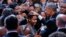 President Barack Obama pats two young girls on the head as he greets guests after speaking at the Congressional Black Caucus Foundation's annual Legislative Conference Phoenix Awards Dinner, Saturday, Sept. 17, 2016, in Washington.