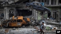 مردم موصل برای نجات جان خود شهر را ترک کرده اند 