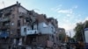 Rescuers work at a site of a residential building hit by a Russian missile strike in Kharkiv, Ukraine, on May 31, 2024.