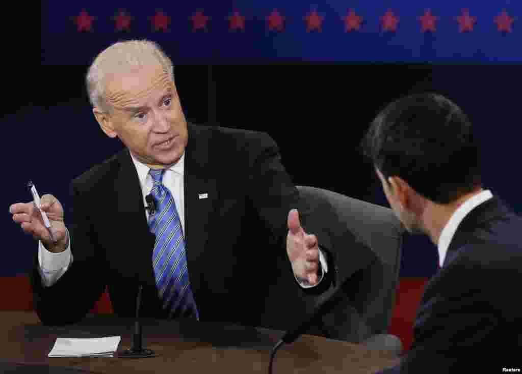 U.S. Vice President Joe Biden (L) debates Republican vice presidential nominee Paul Ryan (R) during the vice presidential debate October 11, 2012. 