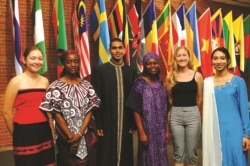 FILE - Berea College international students stand in front of the flags representing the 70 countries where they are from. (Handout photo from Berea)