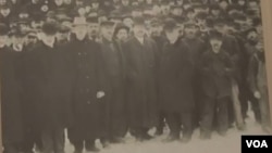 Mayor Christopher Louras showed VOA a very old photograph of factory workers in the city