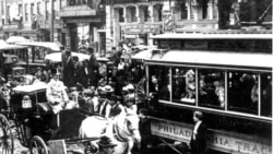 Horse-drawn wagons and electric trolley cars share the streets in 1897 Philadelphia during a time of revolutionary change in transportation and industry. (FILE PHOTO)