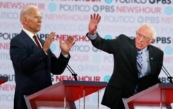 Dvojica vodećih u posljednjim anketama: Joe Biden i Bernie Sanders (Foto: AP)
