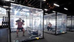 "Nove realnost" u teretanama u Kaliforniji je vežbanje u odvojenim kabinama, Redondo Bič u Kaliforniji 15. juna 2020.