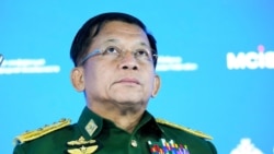 FILE - Commander-in-Chief of Myanmar's armed forces, Senior General Min Aung Hlaing delivers his speech at the IX Moscow conference on international security in Moscow, Russia, June 23, 2021.