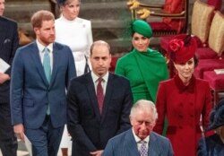 FILE - Britain's Prince Harry (L) and Meghan (2nd R) follow Prince William (C), and Catherine (R) as they depart Westminster Abbey after attending the annual Commonwealth Service in London, March 9, 2020.