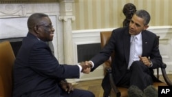 Ghana's President John Evans Atta Mills (left) with President Obama at the White House, Mar 8, 2012