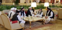FILE - Members of the Taliban delegation are seen at the Sheraton Doha, before the start of the Intra-Afghan dialogue, in Doha, Qatar, July 7, 2019. (Ayesha Tanzeem/VOA)