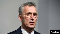 FILE PHOTO: NATO Secretary General Jens Stoltenberg speaks to reporters in Hamburg, Germany January 17, 2020. REUTERS/Fabian Bimmer/File Photo