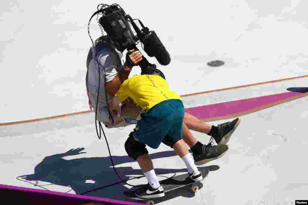 Kieran Woolley of Australia crashes into a cameraman&nbsp;in the men's park skateboarding preliminary round at the 2020 Summer Olympics in Tokyo, Japan.