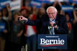 Democratic presidential candidate Sen. Bernie Sanders, I-Vt., makes a point during a campaign stop late, Feb. 16, 2020, in Denver.
