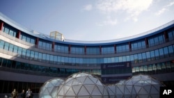 A pollution pod by British artist Michael Pinsky is displayed at the COP25 climate talks summit in Madrid, Spain, Dec. 3, 2019. 