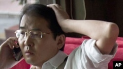 FILE - Attorney Xia Lin, pictured on July 14, 2011, was sentenced to 12 years in prison, Sept. 22, 2016, on fraud charges in what observers said was thought to be the harshest penalty rendered in years against those few willing to take on the ruling Chinese Communist Party.